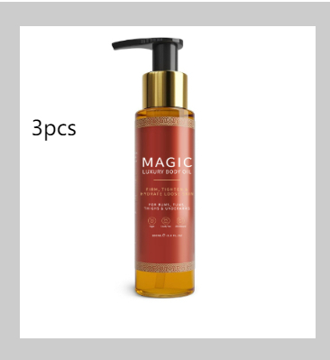 Amber pump bottle of Magic luxury body oil with a gold cap and a red label.