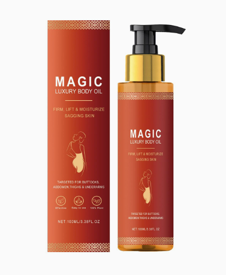 Magic Luxury Body Oil pump bottle and matching red-and-orange box with gold accents.
