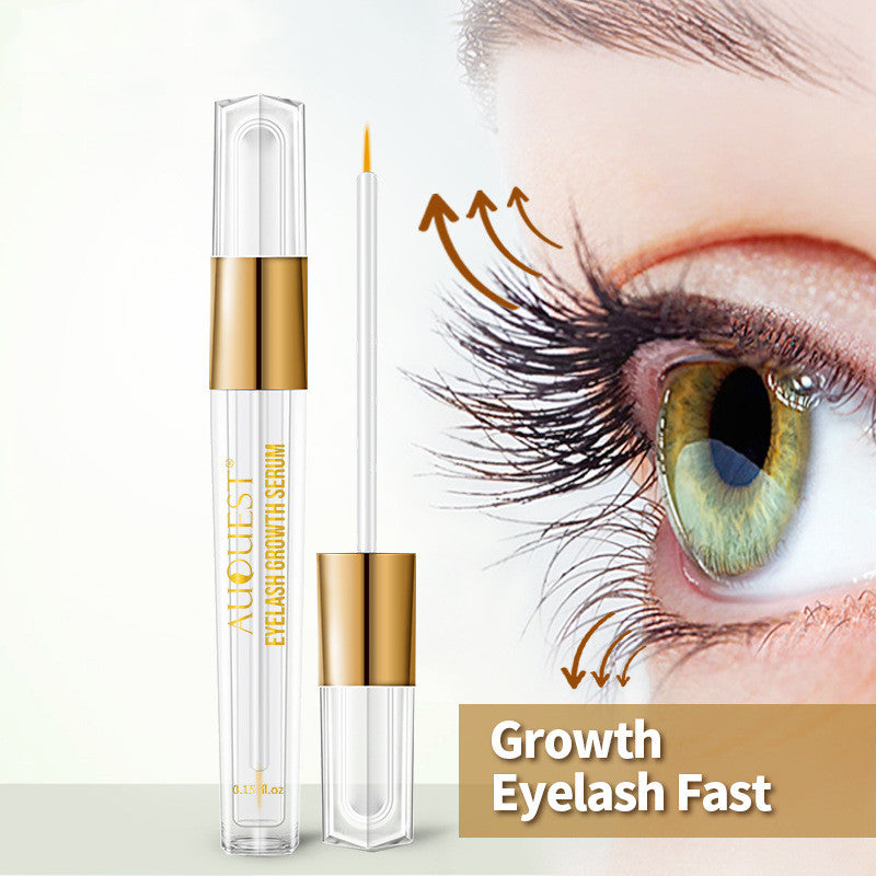 AuQuest clear and gold eyelash serum tube with applicator wand beside a close-up of long eyelashes.