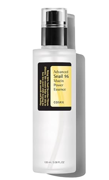 Clear pump bottle of Advanced Snail 96 Mucin Power Essence with a black and yellow label.