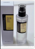 Clear pump bottle and matching white box with yellow and black labels for Snail 96 Mucin Power Essence.