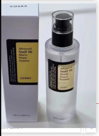 Clear pump bottle and matching white box with yellow and black labels for Snail 96 Mucin Power Essence.