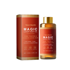 Orange Magic luxury body oil bottle and matching box with gold caps and ornate patterned borders.