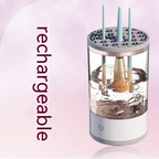 A rechargeable makeup brush cleaner with a clear cylinder, white base, and patterned grey lid holding three brushes in water.